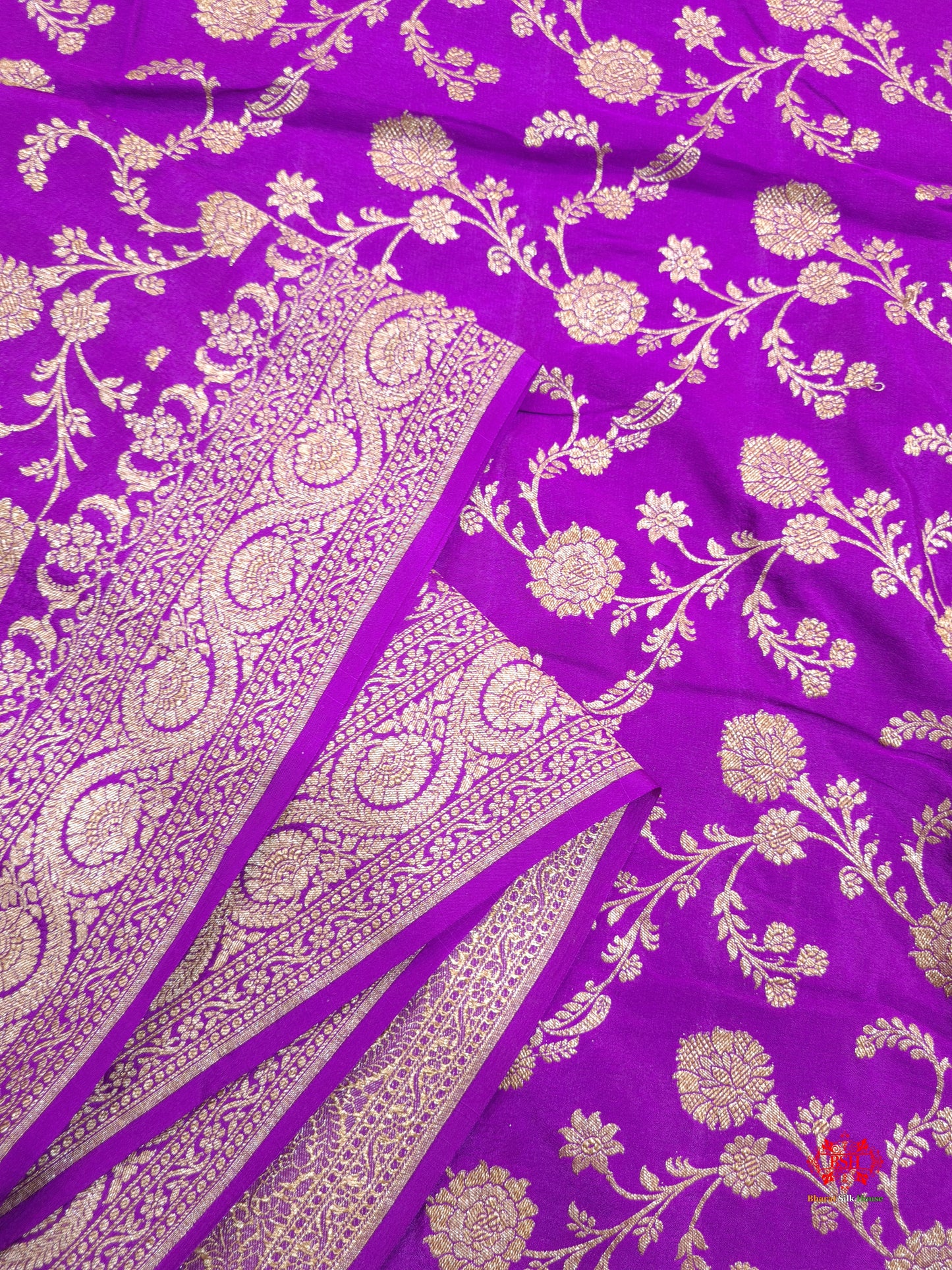 Pure Silk Crape Khaddi Georgette Saree With Antique Zari In Shades Of Magenta