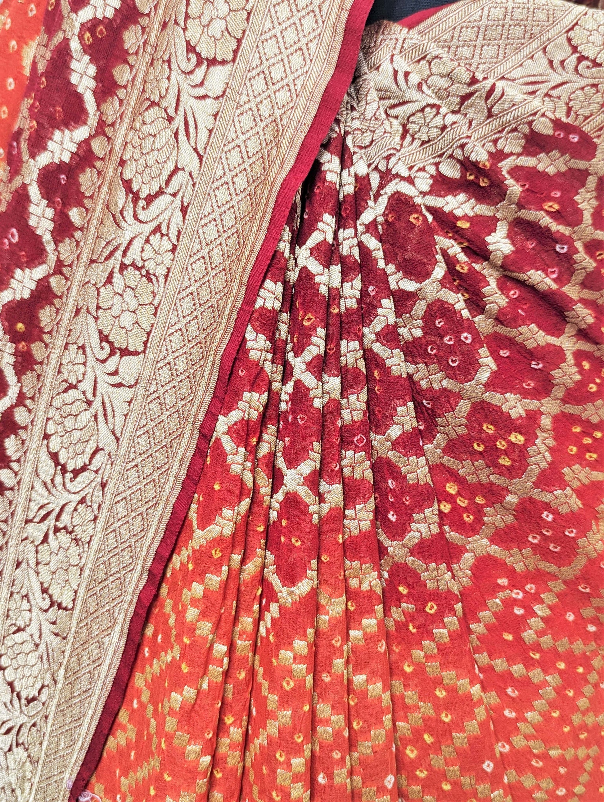 Pure Georgette Banarasi Bandhej Handloom Saree In Dual Shades Of Red & Orange Bandhej Bharat Silk House